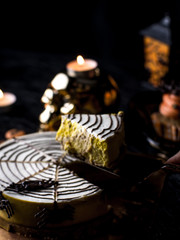 Fancy Halloween food Party Table with Pumpkin Cupcake Muffin and cookies.