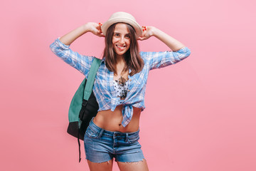 tourist girl on pink background