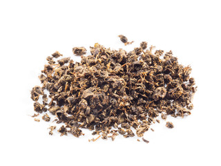 Fermented granular tea from Cherry (Cerasus) leaves on white background