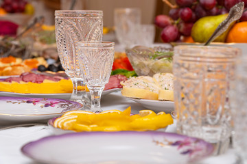 Festive table setting with crystal glasses