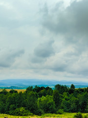 Carpathian hills during the rain with dramatic clouds