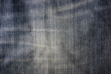 clothing items blue stonewashed faded jeans cotton fabric texture with seams, clasps, buttons and...