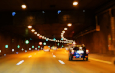  Car driving in a tunnel. Bokeh. Blur background. Traffic. Lights. Underground drive.
