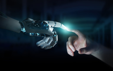 Robot hand making contact with human hand on dark background 3D rendering