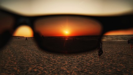 two burning candles on black background © Rafal