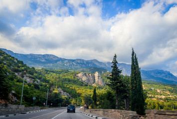 Russian asphalt roads. Background road. Roads in the mountains of Crimea. Travel by car. Road views.