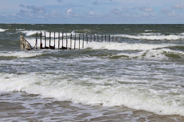 old pier on the beach