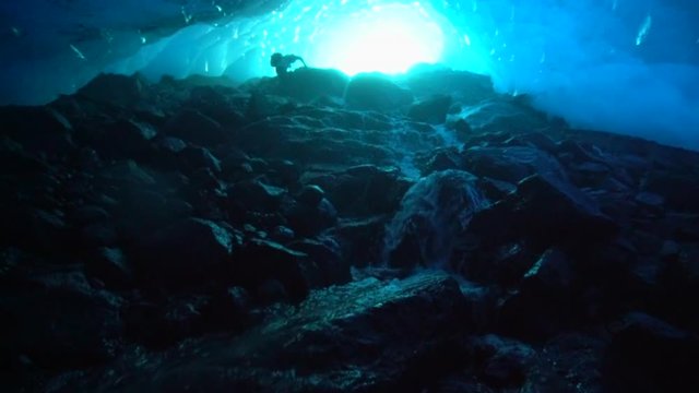 Slow Motion: Taking Pictures in Beautiful Blue Ice Cave, Mendenhall Glacier, Alaska