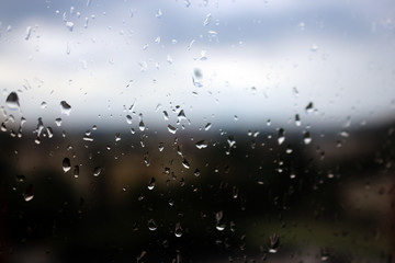 Obraz premium Big rain drops on clear window glass