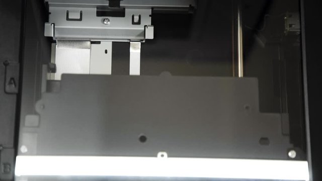 Closeup of a scanner at work.