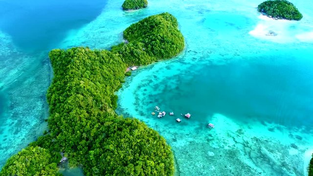 Tropical landscape rainforest hills and azure water in lagoon with clouds on the Siargao island, Philippines. Drone Aerial view 4Kl