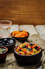 Jeweled Rosh Hashanal rice on a wood background
