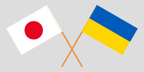 Japan and Ukraine. Crossed Japanese and Ukrainian flags