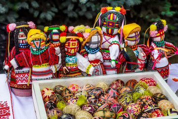 Handmade textile doll, rag doll 'Motanka' in ethnic style, ancient culture folk crafts tradition of Ukraine. Are Most Popular Souvenirs From Ukraine.