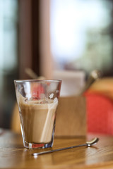 Large cup of coffee latte on a table