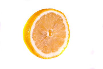 half a lemon on a white background