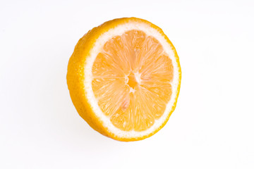 half a lemon on a white background
