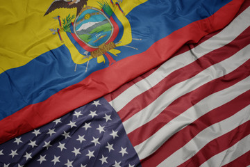 waving colorful flag of united states of america and national flag of ecuador.