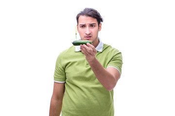 Young man in GMO fruits and vegetables concept