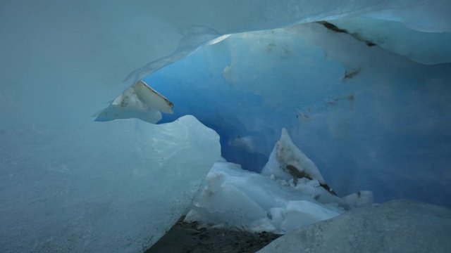 Forward: Entering the Icy Cave of Mendenhall Glacier With the Ceiling Melting in the Area