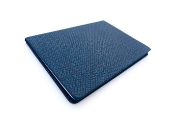Blue leather notebook isolated on white background.