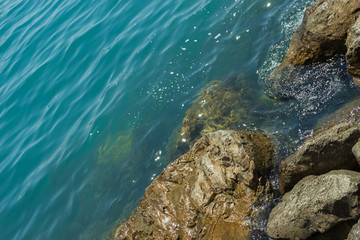 View of the blue water of the Black sea and coastal cliffs on the coast
