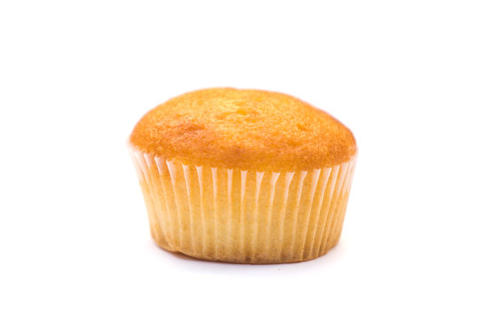 a plain cupcake or madeleine on a white background.