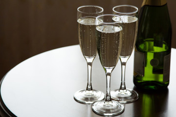 three glasses of champagne