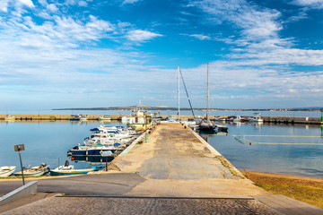 Harbor with docked boats in Privlaka village in the Zadar County of Croatia, Europe.