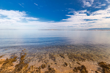 Sea landscape with islands on background. View from Privlaka village in the Zadar County of Croatia, Europe.