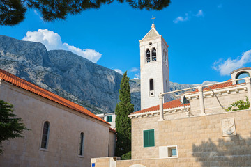 Fototapeta na wymiar Roman-catholic church in Croatia with blue sky