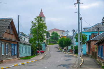 Obraz premium Sebezh, Russia - May, 25, 2019: Image of rural houses along the road in the city of Sebezh, Russia