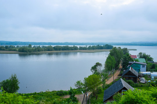 Sebezh, Russia - May, 25, 2019: image of village houses on the lake in the city of Sebezh