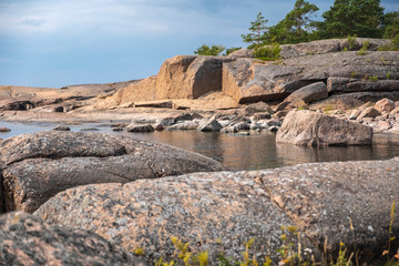 Rocky seashore. Sea summer landscape of a rocky island in the Baltic Sea, Finland.