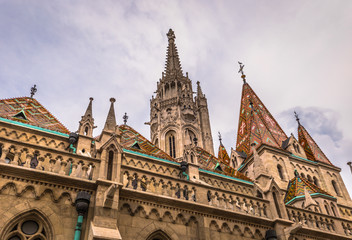 Fototapeta premium Budapest - June 21, 2019: Matthias church in the Fisherman's Bastion on the Buda side of Budapest, Hungary