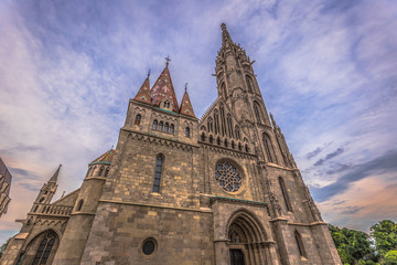 Fototapeta premium Budapest - June 21, 2019: Matthias church in the Fisherman's Bastion on the Buda side of Budapest, Hungary