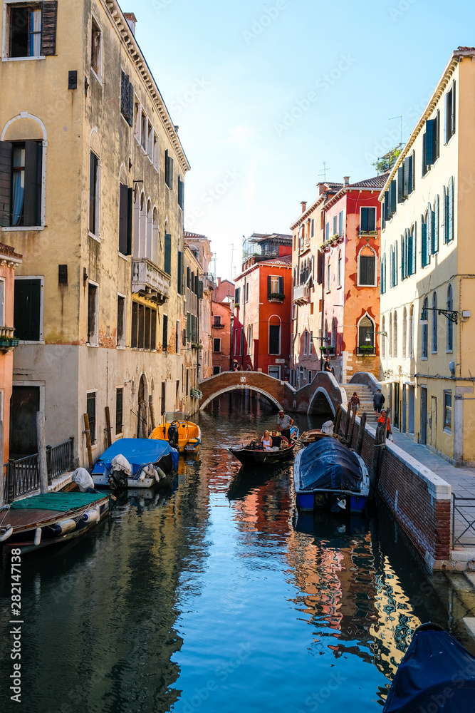 Wall mural Venice, Italy - July, 07, 2019: cityscape with the image of channel in Venice, Italy