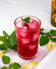 summer refreshing drink with berries of cranberries