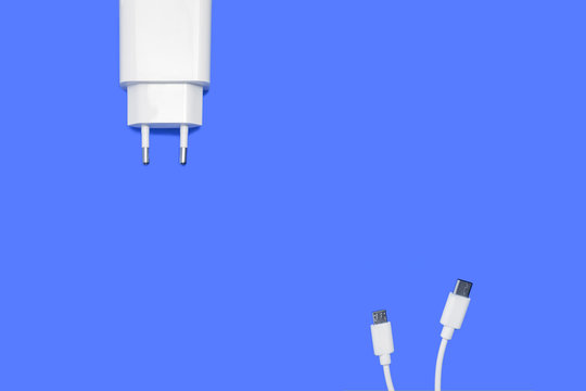 Deconstructed Charger On Blue Background - USB Type C And Micro B Cable