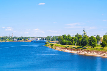 Uglich, Russia - June, 17, 2019: embankment of Volga river in Uglich, Russia with a view to .Kremlin and resurrection monastery