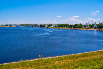 Uglich, Russia - June, 17, 2019: embankment of Volga river in Uglich, Russia with a view to .Kremlin and resurrection monastery