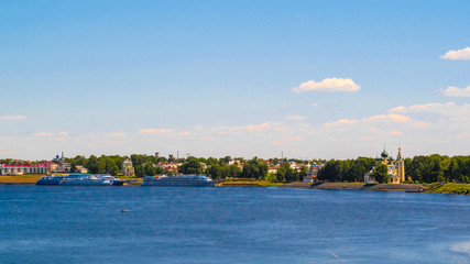 Fototapeta na wymiar Uglich, Russia - June, 17, 2019: embankment of Volga river in Uglich, Russia with a view to .Kremlin and resurrection monastery