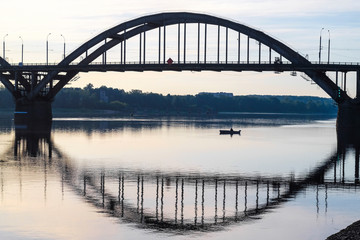 Fototapeta na wymiar Bridge over Volga in Rybinsk, Russia at sunrise