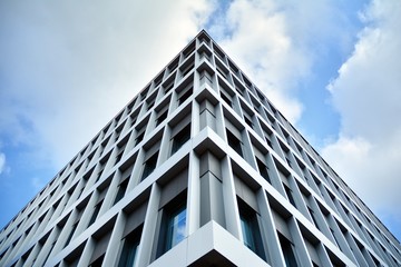 Fototapeta premium modern building with blue sky and clouds