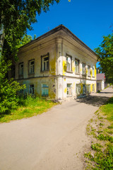 Fototapeta na wymiar Uglich, Russia - June, 9, 2019: lanscape with the image of a street in old russian town Uglich