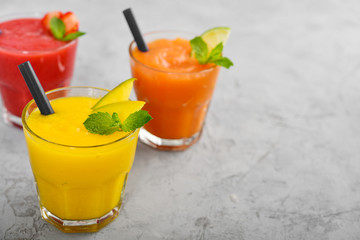 Fresh strawberry, mango and papaya smoothies