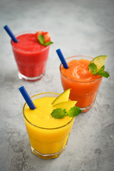Fresh strawberry, mango and papaya smoothies