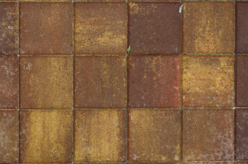Texture of brown-red stone square tile