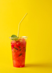 smoothie from ripe red watermelon in a plastic cup