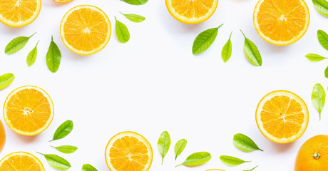 Fototapeta premium Fresh orange citrus fruit with leaves isolated on white background.